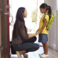 Mother and Daughter going to school